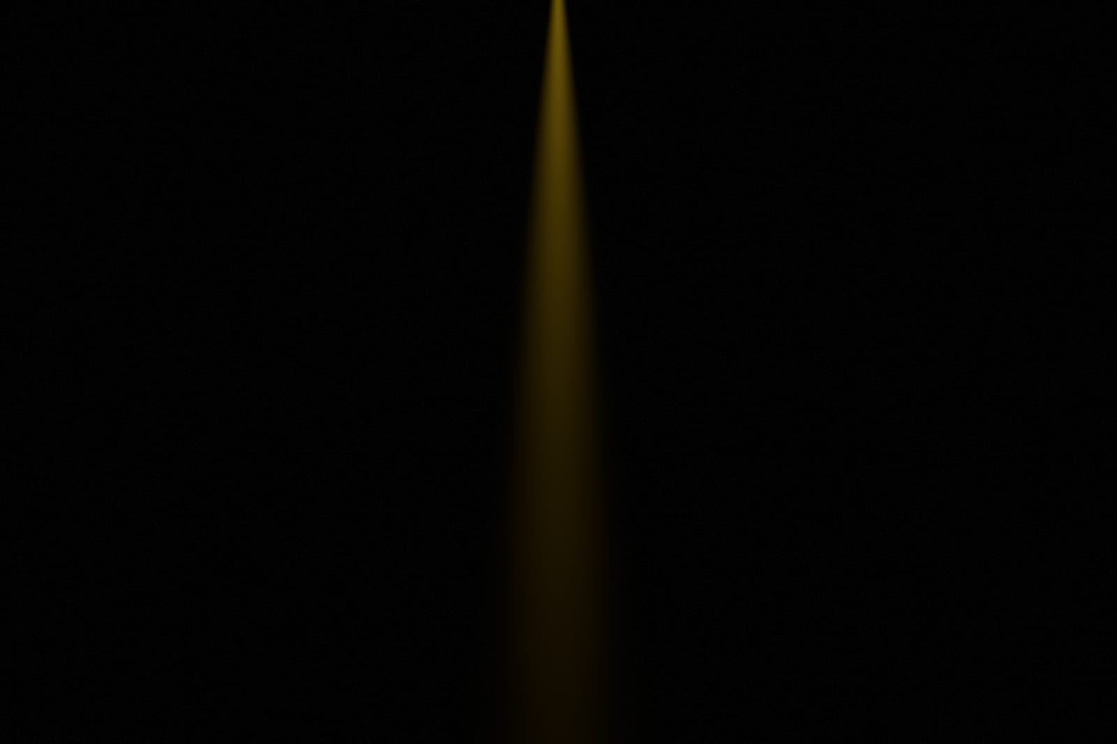 Cathedral Light: a tall shaft of light in a dark hall.